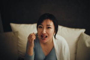 Woman eat spicy expression
